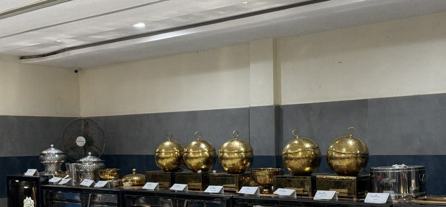 Grand gold buffet spread catered by Delicacies