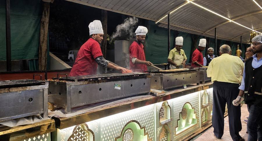 Live grill counter at a Delicacies-catered celebration